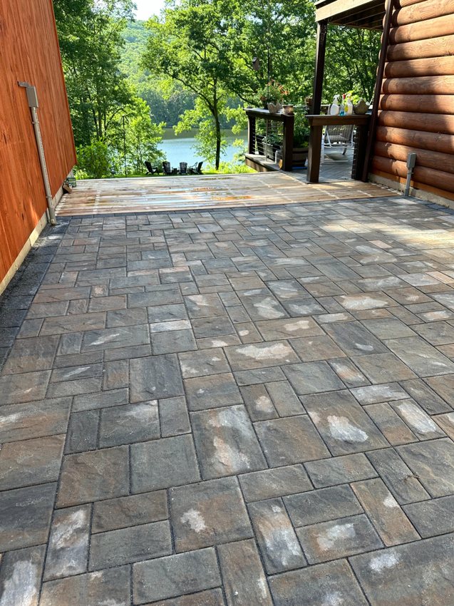 The completed paver patio between the buildings, looking toward the lake.